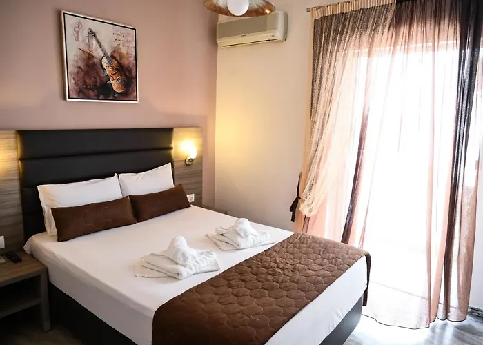 Kostas Олимпиаки-Акти